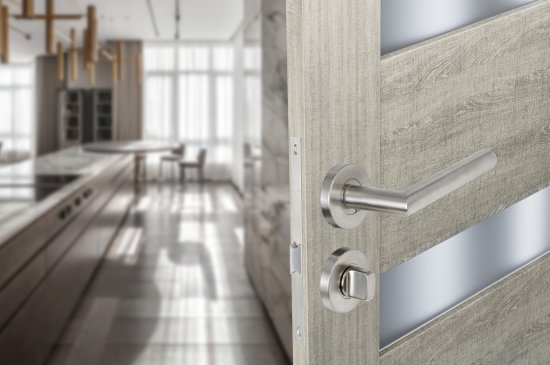 Комплект дверных ручек на розетке Edson WC1R4ST с запиранием цвет нержавеющая сталь