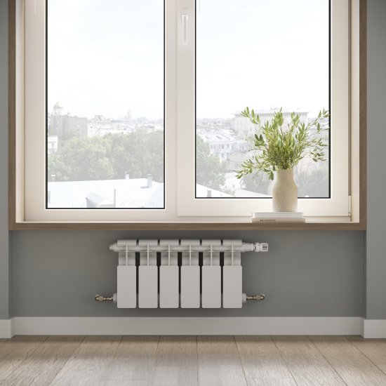 Радиатор секционный Le Heat Bimetal 200/100 6 секций боковое подключение биметалл белый