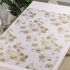 Скатерть Жидкое стекло Цветы прямоугольная 80x120 см цвет золотой